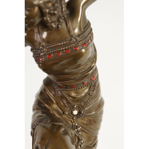 542 - A FINE AND IMPRESSIVE ART DECO BRONZE SCULPTURE OF A DANCING GIRL with coloured enamel jewels to the... 