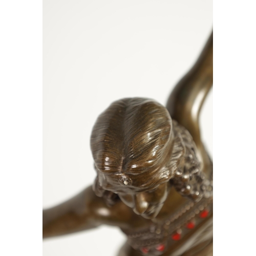 542 - A FINE AND IMPRESSIVE ART DECO BRONZE SCULPTURE OF A DANCING GIRL with coloured enamel jewels to the... 