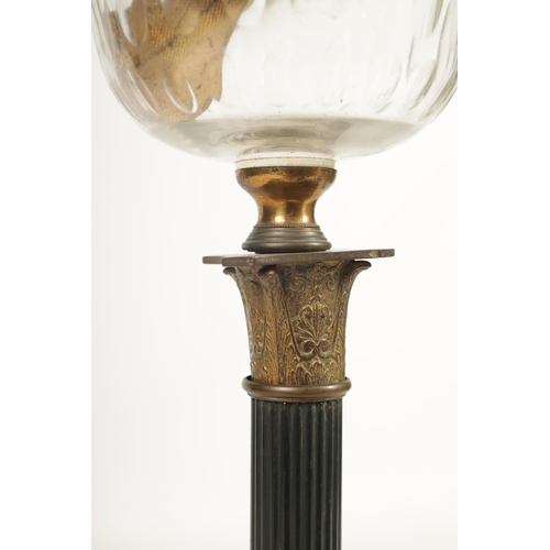 543 - A 19TH CENTURY BRONZE METAL AND GILT EMPIRE STYLE OIL LAMP with clear glass reservoir above a reeded... 