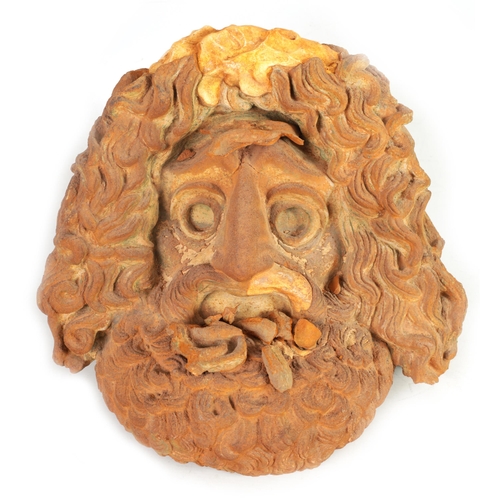 552 - A 19TH CENTURY TERRACOTTA AND PLASTERWORK MASK depicting a bearded man (39cm wide 39cm high )