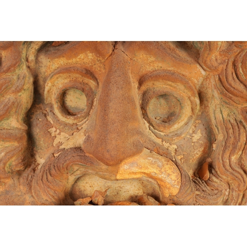 552 - A 19TH CENTURY TERRACOTTA AND PLASTERWORK MASK depicting a bearded man (39cm wide 39cm high )