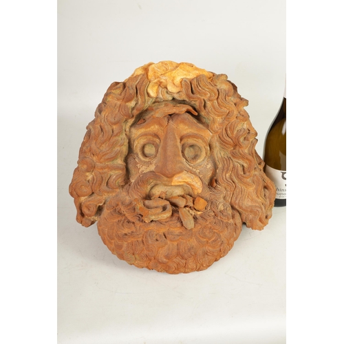 552 - A 19TH CENTURY TERRACOTTA AND PLASTERWORK MASK depicting a bearded man (39cm wide 39cm high )