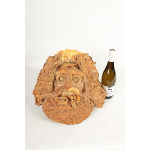 552 - A 19TH CENTURY TERRACOTTA AND PLASTERWORK MASK depicting a bearded man (39cm wide 39cm high )