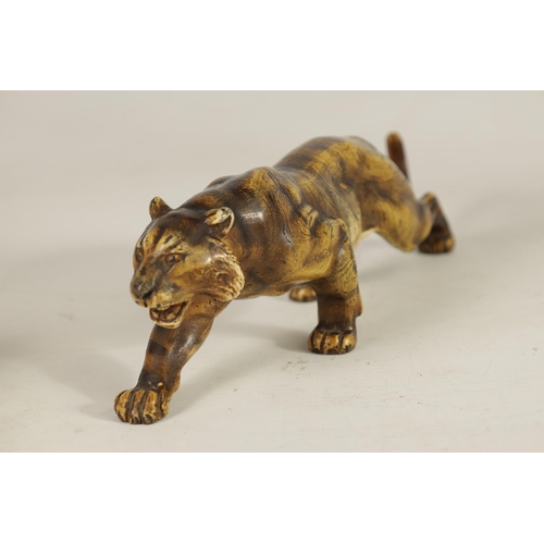 557 - A LATE 19TH-CENTURY BERGMAN-STYLE COLD-PAINTED BRONZE SCULPTURE OF A PROWLING TIGER (21cm long)