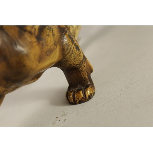 557 - A LATE 19TH-CENTURY BERGMAN-STYLE COLD-PAINTED BRONZE SCULPTURE OF A PROWLING TIGER (21cm long)