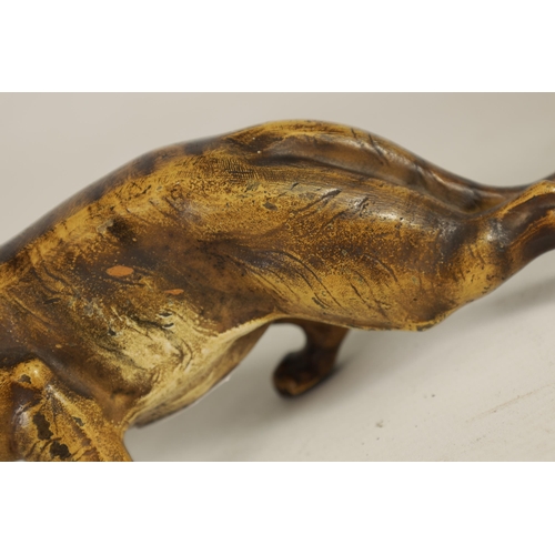 557 - A LATE 19TH-CENTURY BERGMAN-STYLE COLD-PAINTED BRONZE SCULPTURE OF A PROWLING TIGER (21cm long)