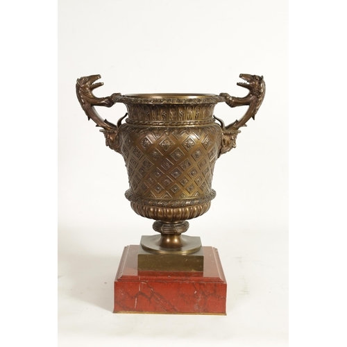 566 - A LARGE 19TH CENTURY GRAND TOUR BRONZE AND ROUGE MARBLE URN SHAPED VASE finely cast with acanthus le... 