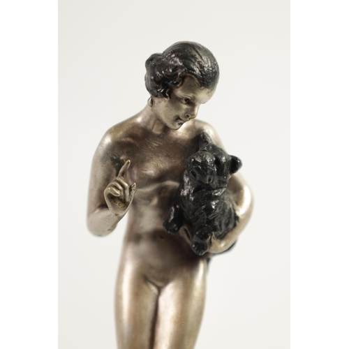 574 - JOSEF LORENZL (1892 - 1950) AN ART DECO COLD PAINTED BRONZE FIGURE depicting a nude lady holding a d... 