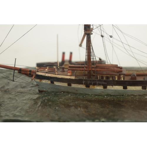 581 - A 19TH CENTURY SHIP'S DIORAMA modelled as a three-masted vessel in a painted sea and ebonised glazed... 