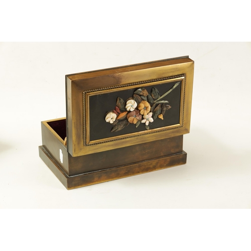 583 - A 19TH CENTURY FRENCH BRASS AND PIETRA DURA INLAID JEWELLERY CASKET decorated in relief with a flora... 