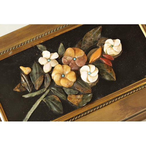 583 - A 19TH CENTURY FRENCH BRASS AND PIETRA DURA INLAID JEWELLERY CASKET decorated in relief with a flora... 