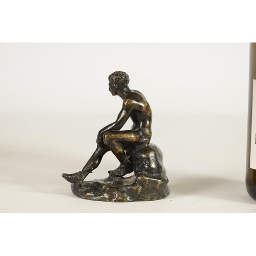 585 - A 19TH CENTURY FRENCH PATINATED BRONZE SCULPTURE OF MERCURY modelled seated on a rocky outcrop. (11c... 