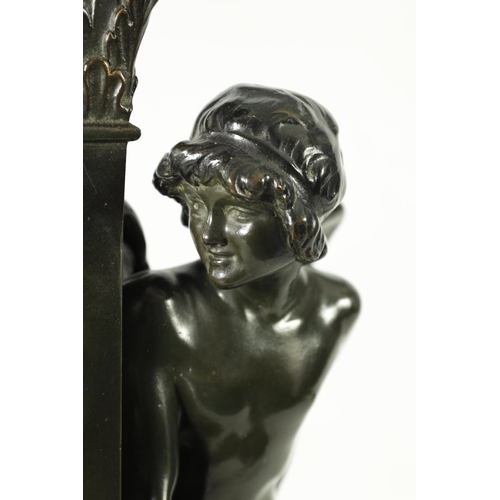 587 - AFTER PAUL PONSARD A 19TH CENTURY BRONZE SCULPTURE DEPICTING CUPID hiding next to a column on a natu... 