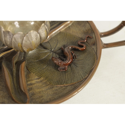 588 - A LATE 19TH CENURY COLD PAINTED BRONZE INKWELL modelled as a Lilly pad with silvered petals and copp... 