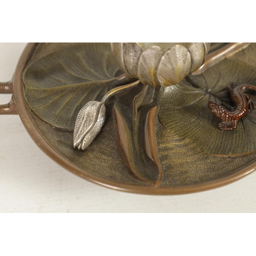 588 - A LATE 19TH CENURY COLD PAINTED BRONZE INKWELL modelled as a Lilly pad with silvered petals and copp... 