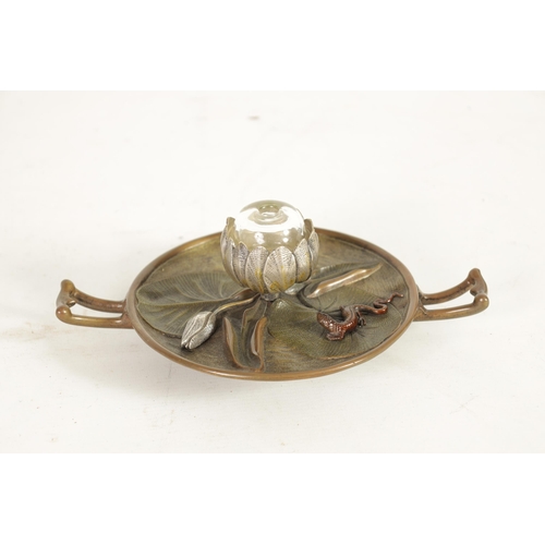 588 - A LATE 19TH CENURY COLD PAINTED BRONZE INKWELL modelled as a Lilly pad with silvered petals and copp... 