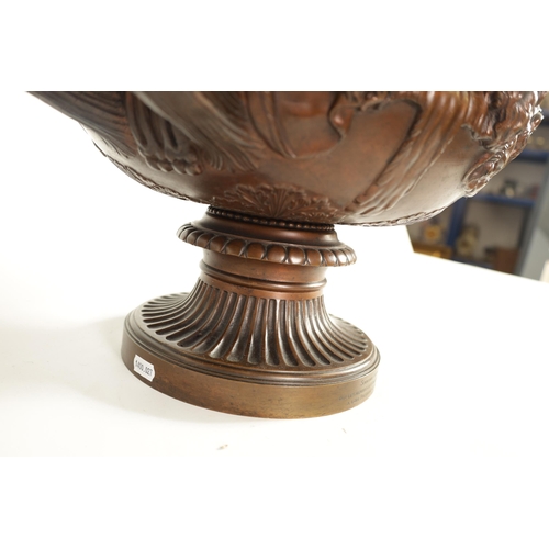 592 - A LARGE LATE 19TH CENTURY PATINATED BRONZE WARWICK VASE BY THE BARBEDIENNE FOUNDRY with masked body ... 