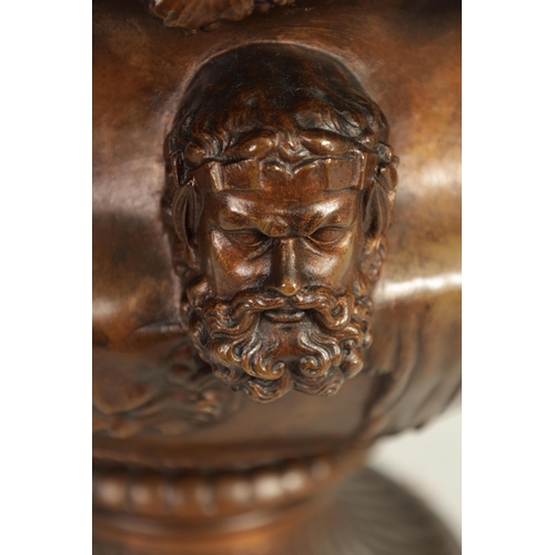 592 - A LARGE LATE 19TH CENTURY PATINATED BRONZE WARWICK VASE BY THE BARBEDIENNE FOUNDRY with masked body ... 