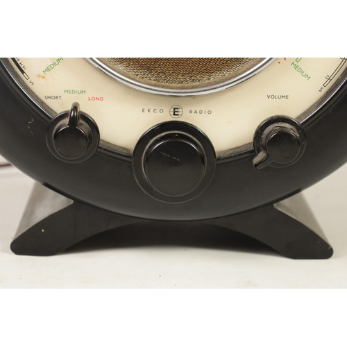 600 - A 1940’S TYPE A22 ECKO RADIO the circular black bakelite case and cream dial surrounding a central s... 