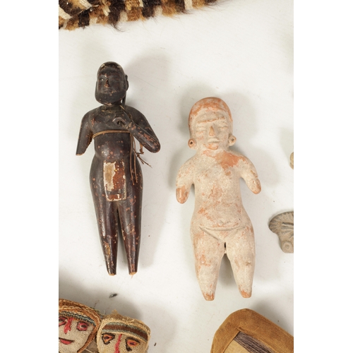 127 - A MIXED LOT OF PERUVIAN DOLLS AND CARVED FIGURES together a tapestry panel of a standing figure (dol... 