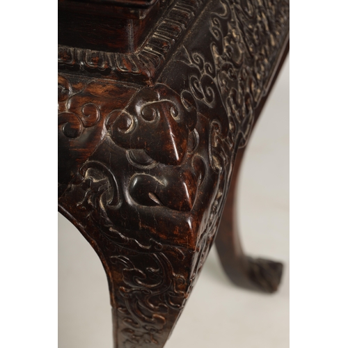 183 - A 20TH CENTURY CHINESE HARDWOOD ALTAR TABLE with inset panelled top above a cushion moulded relief c... 