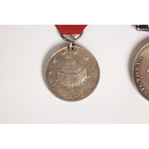 375 - A NAVAL GENERAL SERVICE MEDAL AND A ST. JEAN D’ACRE SILVER SYRIA MEDAL for Lieutenant Edward Alexand... 