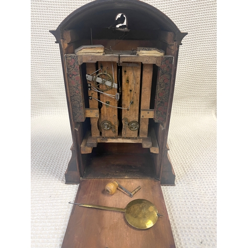 708a - A 19TH CENTURY GERMAN DOUBLE FUSEE INLAID ROSEWOOD CUCKOO CLOCK having an arched top with cuckoo ape... 