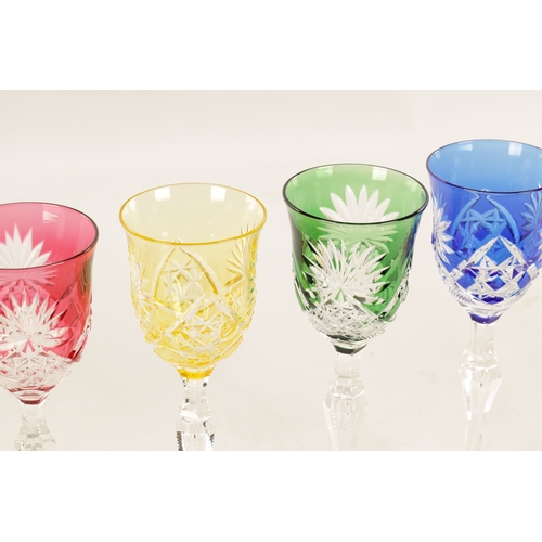 2 - A SET OF EIGHT 20TH CENTURY COLOURED CUT GLASS WINE GLASSES having various coloured glass bowls with... 