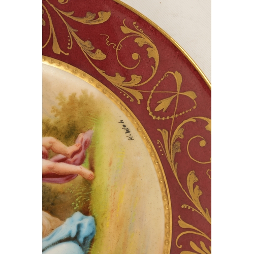 101 - A SMALL LATE 19TH CENTURY VIENNA STYLE PLATE decorated with an over-gilded scrolling foliated maroon... 