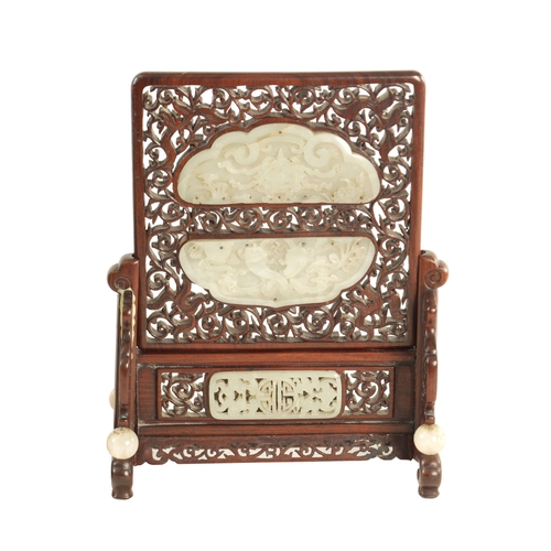 117 - A 19TH CENTURY CHINESE CARVED JADE AND HARDWOOD TABLE SCREEN the pierced fret cut frame with leafwor... 
