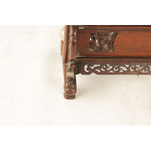 117 - A 19TH CENTURY CHINESE CARVED JADE AND HARDWOOD TABLE SCREEN the pierced fret cut frame with leafwor... 