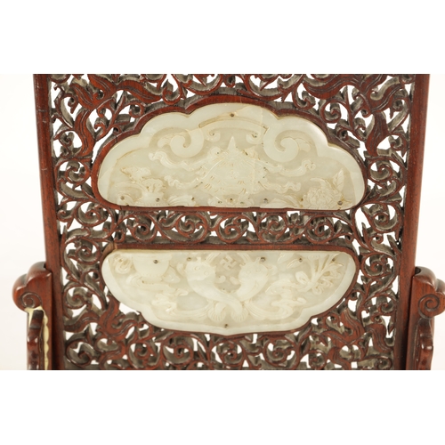 117 - A 19TH CENTURY CHINESE CARVED JADE AND HARDWOOD TABLE SCREEN the pierced fret cut frame with leafwor... 