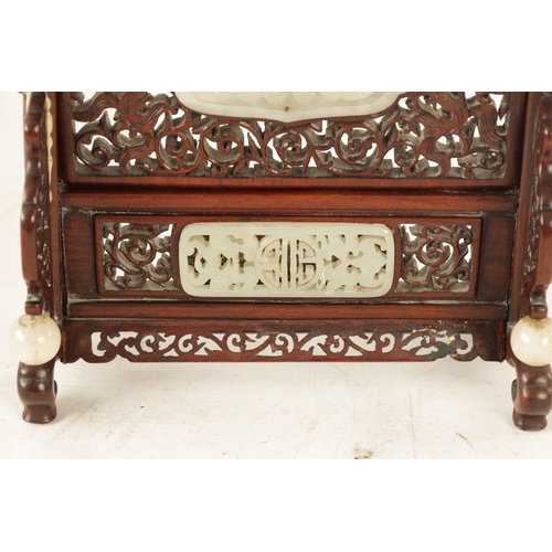 117 - A 19TH CENTURY CHINESE CARVED JADE AND HARDWOOD TABLE SCREEN the pierced fret cut frame with leafwor... 