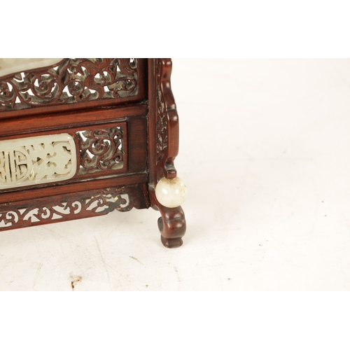 117 - A 19TH CENTURY CHINESE CARVED JADE AND HARDWOOD TABLE SCREEN the pierced fret cut frame with leafwor... 