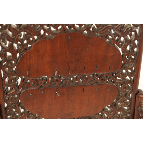 117 - A 19TH CENTURY CHINESE CARVED JADE AND HARDWOOD TABLE SCREEN the pierced fret cut frame with leafwor... 