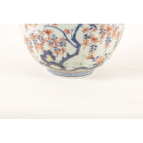 122 - A 19TH CENTURY JAPANESE IMARI BOWL decorated with blossoming foliage and flower sprays. (16.5cm dima... 
