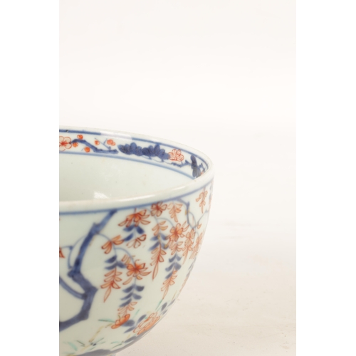 122 - A 19TH CENTURY JAPANESE IMARI BOWL decorated with blossoming foliage and flower sprays. (16.5cm dima... 