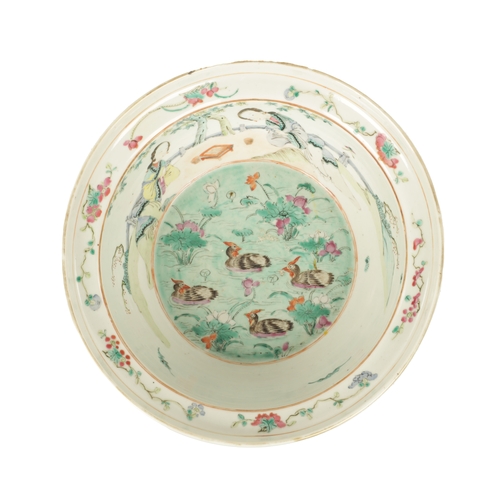 126 - AN 18TH CENTURY FAMILLE ROSE CHINESE EXPORT DEEP BOWL with figural landscape scenes to the border su... 