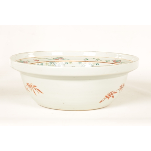 126 - AN 18TH CENTURY FAMILLE ROSE CHINESE EXPORT DEEP BOWL with figural landscape scenes to the border su... 
