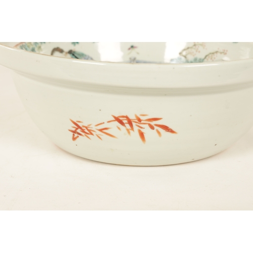 126 - AN 18TH CENTURY FAMILLE ROSE CHINESE EXPORT DEEP BOWL with figural landscape scenes to the border su... 