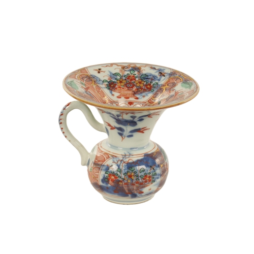 127 - A LATE 19TH CENTURY CHINESE IMARI SPITTOON of squat bulbous form with shaped handle and flared neck,... 