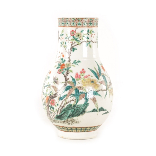 129 - A 19TH CENTURY CHINESE FAMILLE ROSE PORCELAIN BULBOUS VASE decorated with birds and insects amongst ... 