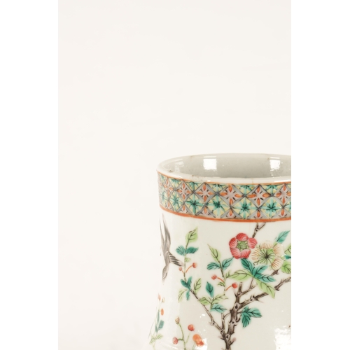 129 - A 19TH CENTURY CHINESE FAMILLE ROSE PORCELAIN BULBOUS VASE decorated with birds and insects amongst ... 