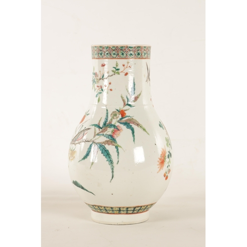 129 - A 19TH CENTURY CHINESE FAMILLE ROSE PORCELAIN BULBOUS VASE decorated with birds and insects amongst ... 