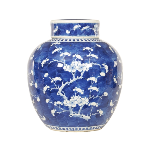 130 - A 19TH CENTURY CHINESE BLUE AND WHITE PORCELAIN GINGER JAR AND COVER decorated with Prunus Blossom -... 