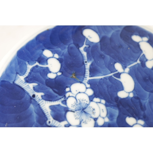 130 - A 19TH CENTURY CHINESE BLUE AND WHITE PORCELAIN GINGER JAR AND COVER decorated with Prunus Blossom -... 