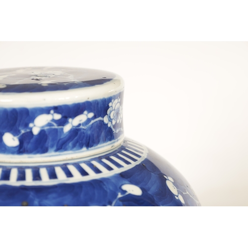 130 - A 19TH CENTURY CHINESE BLUE AND WHITE PORCELAIN GINGER JAR AND COVER decorated with Prunus Blossom -... 