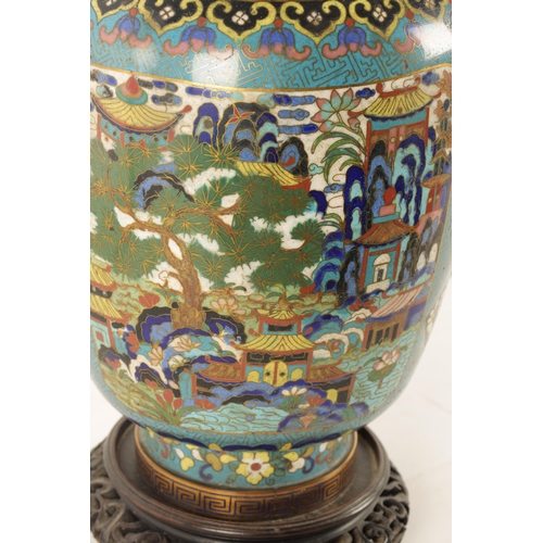 134 - A LATE 19TH/EARLY 20TH CENTURY CHINESE CLOISONNÉ VASE LAMP of multi coloured panelled design on a bl... 