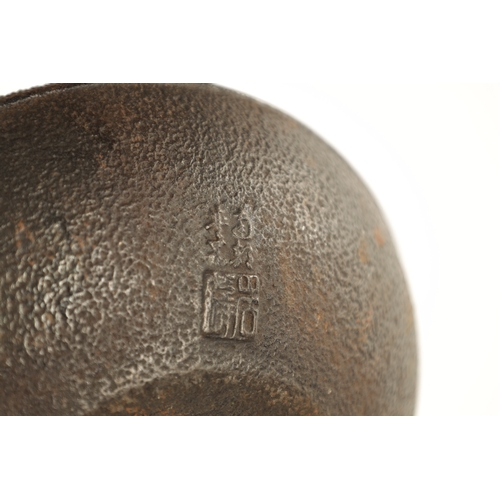 148 - TWO MEIJI PERIOD JAPANESE CAST IRON KETTLES both of squat bulbous form with textured decoration and ... 