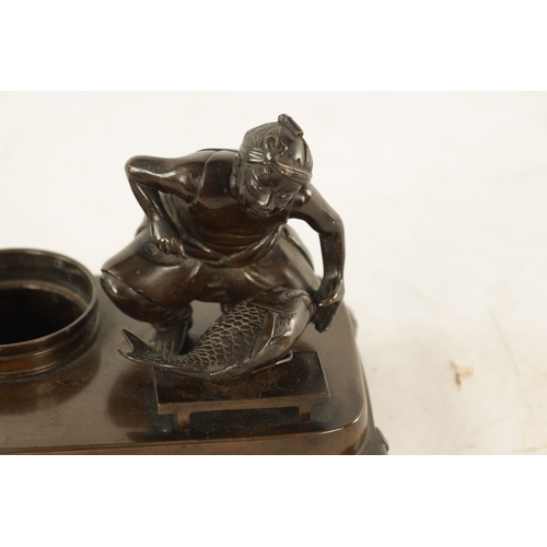 156 - A JAPANESE MEIJI PERIOD PATINATED BRONZE SCULPTURE Modelled as a fishmonger standing on a raised bas... 